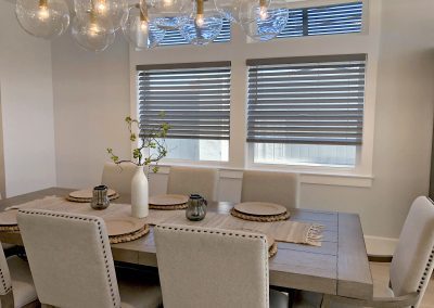 Contemporary dining room with glass globe chandelier